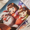 Festive illustrations from custom Christmas book for siblings showing Santa with two kids.